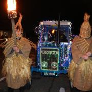The tractor parade led by the mummers.