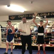 Ben Millar has his arm raised as he secures the Mid Ulster title.