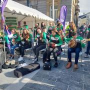 Roslea CCE musicians performing on the Diamond, Enniskillen on St. Patricks Day.