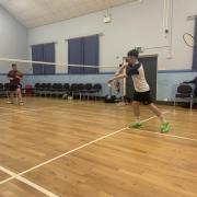 Action from the final of the Aughadrumsee Badminton Club tournament.