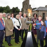 Pictured at the lighting of the Jubilee Beacon are David Monaghan, Scouting Ireland; George Irvine, Fermanagh Scouts; Jane Styles, Deputy Lieutenant; Mandy McQuade, Co. Fermanagh Guides; Rosemary Forde, County Scout Commissioner; Garry Clarke, Fermanagh