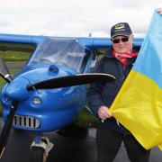 Flying Farmer, Roger Bell, with his Ukraine flag on his visit to Co.Fermanagh. His aircraft was built in Ukraine.