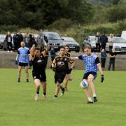 Conor McAloon hits a score for Belcoo.