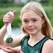 Annabel Morrison, with her gold medal 3000 meters and Silver 1500 meters at The All Ireland Club Championships..