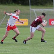 Tiarnan Bogue breaks free from the challenge of Johnny O'Reilly