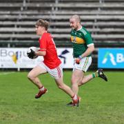 Aodhan McCavana looses touch with Ger O'Keefe as he heads towards a goal