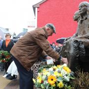 Pictured at the 50th anniversary of the Belturbet bomb on December 28, 1972 is Anthony O'Reilly, laying a wreath at the memorial to his sister, Geraldine O'Reilly, and Patrick Stanley from Co. Offaly, who were both killed in the bombing. Photo:
