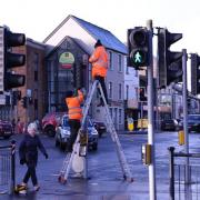 Traffic lights being fixed after they were struck by a vehicle on Thursday, January 12. Photo: John McVitty.