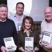 Pictured at the launch of the book, 'Boatman For Mountbatten', are Nevin Brown, Advocacy Case Worker, South East Fermanagh Foundation (SEFF); Kenny Donaldson, Director of Services, SEFF; Mary Hornsey, mother of teenager Paul Maxwell, to whom the