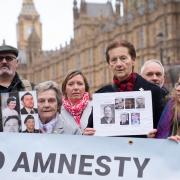 Members of the victims group South East Fermanagh Foundation (SEFF) demonstrate outside the Houses Of Parliament in Westminster.  Picture date: Picture by PA / Stefan Rousseau