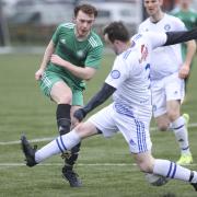 Conor Love converted his penalty for Enniskillen Athletic in their shoot out win over Dergview Reserves.