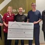 At the presentation of a cheque for £3,066.42 to a specialist cancer unit at Altnagelvin Hospital, with the funds raised by the Fr. John Kearns Memorial Run in late 2022.
