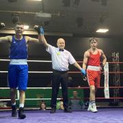 Rhys Owens has his arm raised as he claimed the National U22 title last Saturday.