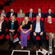 The former editor of the Impartial Reporter Denzil McDaniel (third from right, back row) with other panellists at last week’s “Media in conflict and peace” evening, part of the Queen’s University event marking the 25th anniversary