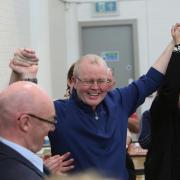 A delighted Sheamus Greene being congratulated as he wins a seat for Sinn Féin in the Erne East DEA. Photo: Trevor Armstrong.