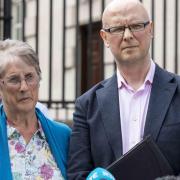 Patsy Kelly's widow Teresa and son, Patsy Kelly Jr at the High Court in Belfast after a preliminary hearing as the family of the nationalist councillor killed by Loyalist paramilitaries are set to mount a legal challenge to a decision to refuse a