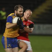 Richard O'Callaghan comes under pressure from Che Cullen during last year's championship.