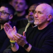 Barry McGuigan watching a boxing match. Photo by Richard Crease.