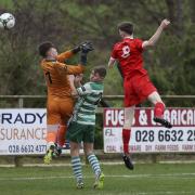 Joel Byrne gets a head in on goal during Enniskillen Rangers defeat to Strathroy Harps.