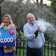Jonny Johnston and his partner Christina Williams from County Fermanagh, celebrate at the Culloden Estate & Spa Hotel in Belfast, after winning £3,800,000 on the Lotto draw. Picture by Liam McBurney/PA Wire