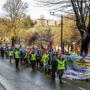 Workers participate in the march from the Round 'O to The Diamond, Enniskillen.