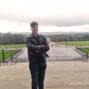 17-year-old MYP hopeful Owen McKinley pictured on the steps of Stormont.