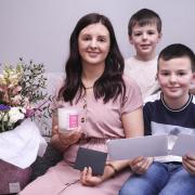 Natalie Holme, Fivemiletown, winner of The Impartial Reporter, Mother Day Prize celebrating with Louis and Ollie.