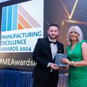 Catriona McGorman (Mannok Continuous Improvement Practitioner) is presented the Operational Excellence award at the Manufacturing Excellence Awards by host Colm O’Regan