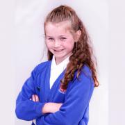 Sophie Cadden a pupil at The Model Primary School, who recently won The Seamus Heaney Award for her poetry.