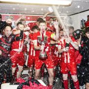 Enniskillen Rangers captain Ciaran Smith celebrates with the Mercer League trophy