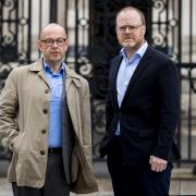 Investigative journalists Barry McCaffrey (left) and Trevor Birney standing outside Belfast High Court. Photo by Liam McBurney/PA Wire.