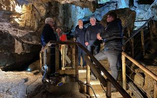 Farmers enter the underground caverns at Marble Arch Caves.