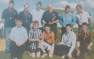 THE Fire Brigade team who won It's a Knockout (back from left) Conal Kane, Kenneth Neilan, John Feely, John Maguire, Donal Keown and Charlie Kane; (front) Christopher Ryder, Killian McGloin, Mark Bracken, Neil Ward and Barry McCann. 2008.