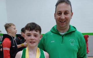 Conall McGrath with his coach, Oliver Kelly.