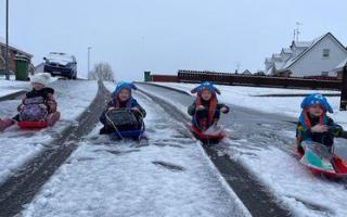 Cara, Cian, Lorcan and Finn McAloon who sled their way to school in Maguiresbridge on Friday morning.