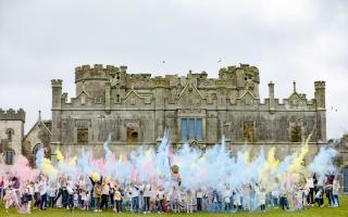 The participants celebrating the end of the vibrant event at historic Necarne. Photos by Donnie Phair.
