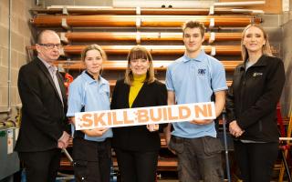 John Moss, Head of Sustainability, Construction and Transport, South West  College (SWC), pictured with apprentice Katie Holmes; Celine McCartan, principal and Chief Executive, SWC; apprentice David Bateman Smith, and Rachel Dorovatas, CITB NI.