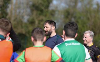 St. Aidan's teacher and football manager Richie O'Callaghan giving instructions at Tuesday's training session