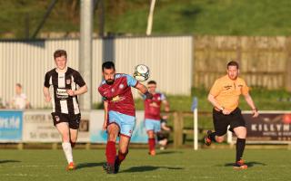 Ryan Hanna on the ball against Dergview Reserves in the final of the Mulhern Cup.